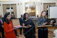 Marie  Royce, Managing Director of Global Strategic Initiatives and Nishan  Biswal , Assistant Secretary of State for South and Central Asia reading  the letter of appreciation from  Congressman Ed Royce and presenting  the United States Fag from the US Congress.