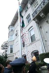 Charge D' Affaires Ambassador Taranjit Singh Sandhu unfurling the National Flag, followed by singing of the National Anthem.