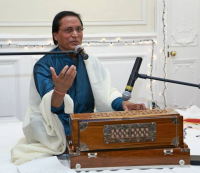 Singing of bhajans by Arjun Jaipuri.
