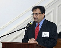 Minister Govind Mohan welcoming the guests at the panel discussion event "The Future of Education in India - Launching Cooperative India-US Initiatives", hosted at the Embassy on December 2.
