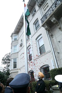 Charge D' Affaires Ambassador Taranjit Singh Sandhu unfurling the National Flag, followed by singing of the National Anthem.
