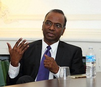 Moderator Minister Sridharan Madhusudhanan moderating the panel discussion.