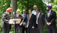 Mr. Jasdip â€œJesseâ€ Singh reading out the congratulatory message sent by Governor Martin O'Malley of Maryland on the occasion of Baisakhi.