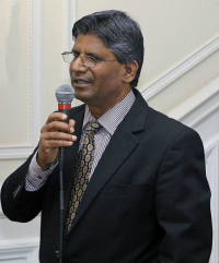 Second Secretary A.K. Berwal welcoming the guests at the event â€œAn Evening with the Gundechas â€“ Appreciation and Understanding of Dhrupadâ€, hosted at the Embassy on May 5.