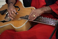 Pandit Vishwa Mohan Bhatt on Mohana Veena during the cultural event of 'Raag, Rhythm and Repartee: A Musical Evening of 'Jugalbandi', presented by Embassy of India, Washington DC on April 6.