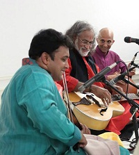 Presentation of 'Raag, Rhythm and Repartee: A Musical Evening of 'Jugalbandi' - A Duet Between Pandit Vishwa Mohan Bhatt (Mohana Veena) and H.N. Bhaskar (Violin) accompanied by Krishna Ramdas (Tabla), Vijay Ganesh (Mridangam) and Sowmiya Narayanan (Ghatam), presented by Embassy of India, Washington DC on April 6.