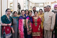 Ambassador Arun K. Singh and Sikh Scholar Dr. Pavanjit Kaur Sawhney with the Giddha dance performers at the 'Baisakhi' celebrations hosted at the Embassy Residence on April 23, 2016.