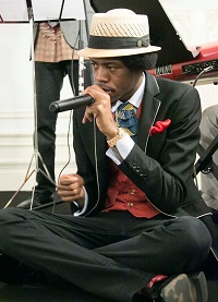 Christlylez Bacon accompanying as Human Beatbox and on Spoons during the cultural event "'Bhairavi Beatbox' - Hindustani Music Meets Hip Hop", presented by Embassy of India, Washington DC on May 20.