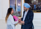 Presentation of bouquet to Sandhya Menon, author, at the Book Reading event titled "When Dimple Met Rishi" with Sandhya Menon, hosted at the Embassy on September 1, 2017.