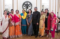 Ambassador Arun K. Singh and Dr. Maina Chawla Singh with guests and artists.