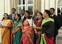 Singing of Christmas songs by Choir group from Free Methodist Church Choir, Maryland, led by Rev. Samuel Ernest Paul.