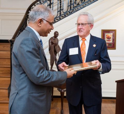 Mr. Jim Warren, Regional Director of Clemson University Alumni Club presenting a memento to Amb. Santhosh Jha, DCM at the reception for the members of the Clemson University Alumni at the Embassy of India, Washington, DC, on November 1, 2017.