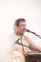 Presentation of 'Harmony- a Musical Offering of Ghazals and Bhajans on the Eve of Birth Anniversary of Gandhiji'' by Sudhir Narain (vocal & Harmonium).