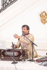 Presentation of 'Harmony- a Musical Offering of Ghazals and Bhajans on the Eve of Birth Anniversary of Gandhiji'' by Sudhir Narain (vocal & Harmonium).