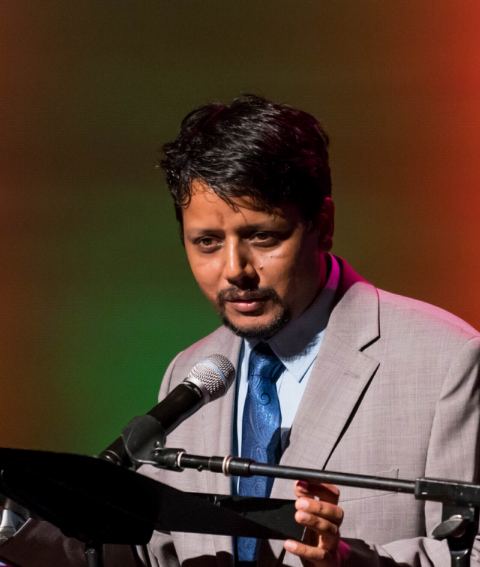 First Secretary Mr. Shambhu Hakki welcoming the guests at the concert "An Evening of Sufi Music" by Zila Khan at Lohrfink Auditorium at Georgetown University on Sunday, September 16, 2018, organized as part of India@70 celebrations.