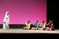 Ms Chitra Krishnamurti, Director/founder of Nritalaya School of Odissi Dance (extreme left) playing Mother Teresa in  'Joy of Loving: Odissi Dance Drama on Mother Teresa' at Hartke Theatre, Catholic University of America (CUA), on September 12, 2015,  presented  by Nritalaya School of Odissi Dance  in association with Embassy of India, Washington DC