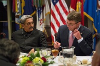 U.S. Secretary of Defense Ash Carter speaks with Indian Minister of Defence Manohar Parrikar during a dinner at the Pentagon, Dec. 9, 2015. The Two leaders met to discuss matters of mutual importance (DoD photo by Senior Master Sgt. Adrian Cadiz)