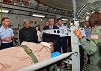 PACAF Airmen demonstrate the aeromedical evacuation capabilities of the C-17 Globemaster III to Manohar Parrikar, the India Defence Minister (left), and Arun K. Singh, the Indian Ambassador to the U.S., on Joint Base Pearl Harbor-Hickam, Hawaii, Dec. 7, 2015. The Indian air force has the world's 2nd largest fleet of C-17s, behind the U.S., and these aircraft have already proven their value in supporting international response to regional crises. (U.S. Air Force photo by Tech. Sgt. Aaron Oelrich/Released)
