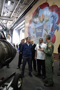 US Navy officials briefing Defence Minister Manohar Parrikar at USS Dwight D. Eisenhower on December 10, 2015.