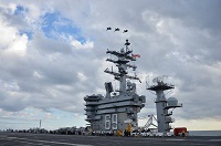 Defence Minister Manohar Parrikar becomes the first Indian Defence Minister to embark a US aircraft carrier, USS Dwight D. Eisenhower in Atlantic Ocean on December 10, 2015.