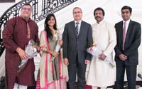 Minister N. K. Mishra and First Secretary Satish Kumar Sivan with the artists after the presentation of bouquets.