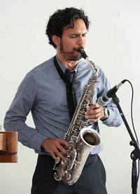 Aakash Mittal (on Saxophone) during the "New World Raga: Communicating Across Musical Cultures' cultural event presented by Embassy of India, Washington DC on April 22.