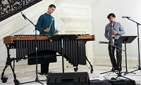 Aakash Mittal (on Saxophone) and Payton MacDonald (on Marimba) during the "New World Raga: Communicating Across Musical Cultures' cultural event presented by Embassy of India, Washington DC on April 22.