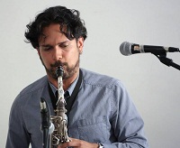 Aakash Mittal (on Saxophone) during the "New World Raga: Communicating Across Musical Cultures' cultural event presented by Embassy of India, Washington DC on April 22.
