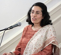 Ms. Divya Kapoor emceeing the event "'In Pursuit of Gods and Goddesses' - Tales of Fieldwork Chasing Temples and Images" - Talk by Prof. Vidya Dehejia, presented by Embassy of India, Washington DC on April 25.