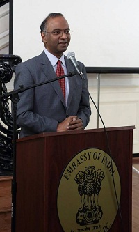 Minister Sridharan Madhusudhanan welcoming the guests and introducing the event "'In Pursuit of Gods and Goddesses' - Tales of Fieldwork Chasing Temples and Images" - Talk by Prof. Vidya Dehejia, presented by Embassy of India, Washington DC on April 25.
