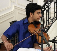 'Violin' Artist Kamalakiran Vinjamuri performing during "Rhythm of Freedom - Thematic 'jugalbandhi' Concert - Rebellion, Victory and Harmony", at Embassy of India, Washington DC on August 31.
