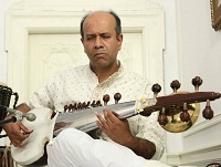 'Sarod' Artist Soumya Chakraverty performing during "Rhythm of Freedom - Thematic 'jugalbandhi' Concert - Rebellion, Victory and Harmony", at Embassy of India, Washington DC on August 31.
