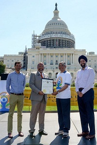 Dr. Jai Jalisi, Delegate of Maryland, presenting the Proclamation of Governor of Maryland Larry Hogan to Ambassador Arun K. Singh, at the celebration of the 2nd International Day of Yoga at Capitol Hill Lawns, Washington, DC, on June 18, 2016.