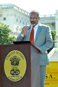 Dr. Jai Jalisi, Delegate of Maryland, reading out the Proclamation of Governor of Maryland Larry Hogan, at the celebration of the 2nd International Day of Yoga at Capitol Hill Lawns, Washington, DC, on June 18, 2016.