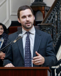 Jeremy Woodrum, Legislative Director to Congressman Jim Crowley, speaking on the occasion.