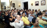 Audience participating enthusiastically during the experimental session.