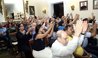 Audience participating enthusiastically during the experimental session.