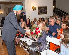 Ambassador Shri Navtej Sarna presenting a bouquet of flowers to Mrs. Joyce Robbins, wife of Mr. Kenneth X. Robbins at the Embassy of India on June 9, 2017