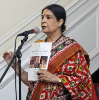 Ms. Manjula Kumar of Smithsonian, introducing the Gundecha Brothers and the accompanying musicians, to the audience.