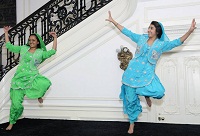 Bhangra Dance performance by GWISA students Saira Agarwala and Mukta Ghorparey.
