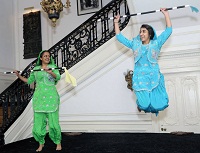 Bhangra Dance performance by GWISA students Saira Agarwala and Mukta Ghorparey.
