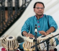 Tapan Modak playing the Tabla.