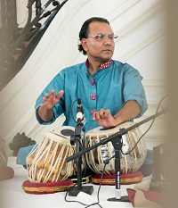 Tapan Modak playing the Tabla.