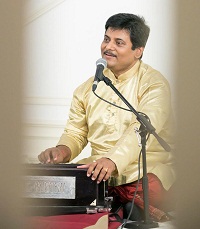 Presentation of 'Forgive My Fondness: An Evening of Bengali Music' by vocalist Santanu Bhowmick.
