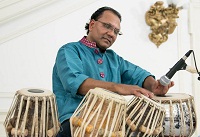 Tapan Modak playing the Tabla.