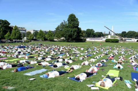 Ambassador Navtej Sarna and others doing Yoga at the 4th International Day of Yoga organized by the Embassy of India in partnership with Friends of Yoga at the US Capitol in Washington, DC on June 16, 2018.