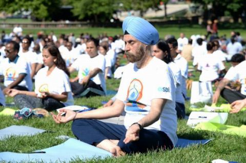 Ambassador Navtej Sarna and others doing Yoga at the 4th International Day of Yoga organized by the Embassy of India in partnership with Friends of Yoga at the US Capitol in Washington, DC on June 16, 2018.