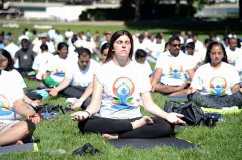 Guests participating in Yoga session at the 4th International Day of Yoga organized by the Embassy of India in partnership with Friends of Yoga at the US Capitol in Washington, DC on June 16, 2018.