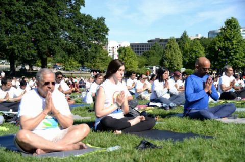 Guests doing Yoga at the 4th International Day of Yoga organized by the Embassy of India in partnership with Friends of Yoga at the US Capitol in Washington, DC on June 16, 2018