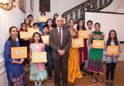 Distribution of awards by DCM Mr. Santosh Jha to winners of various competitions in Hindi at Vishwa Hindi Diwas Celebrations at Embassy of India on Saturday, 20 January 2018.
